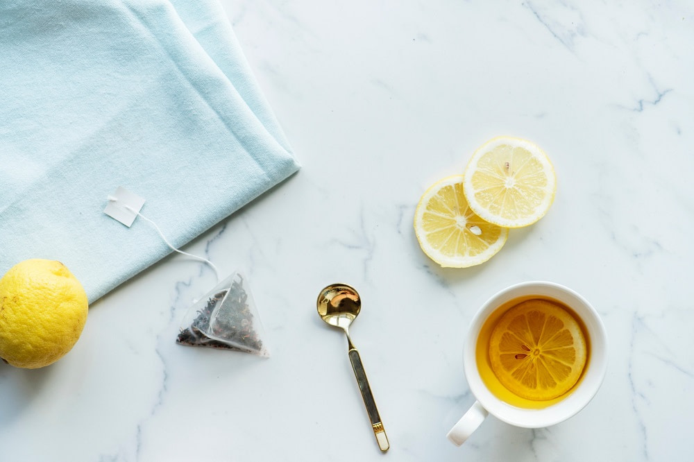 Lemon tea, teabag and spoon