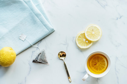 Lemon tea, teabag and spoon